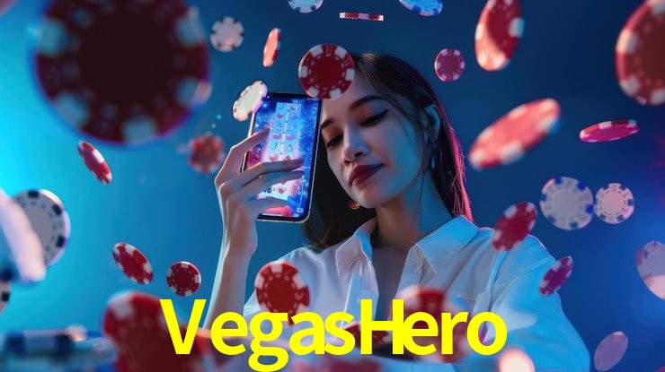 Una escena digital vívida inspirada en casino con VegasHero mostrado prominentemente, luces brillantes, fichas, cartas y acentos dorados.